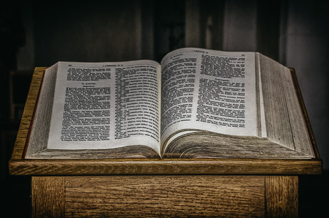 Who is qualified to read the Bible in church?