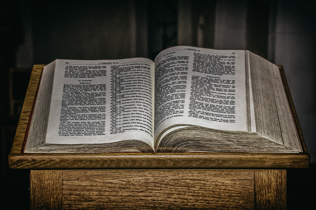 Who is qualified to read the Bible in church?